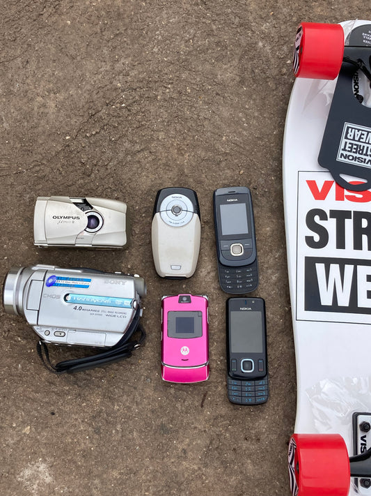 2000’s Essentials Retro Phones/Cameras/Camcorders/skateboard